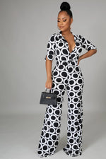 Load image into Gallery viewer, Chic Me Black &amp; White Jumpsuit Dazzled By B
